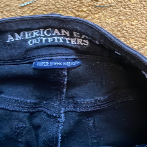 Bespoke patched mid-rise extra stretchy flare washed black denim - Picture 15 of 16